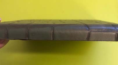 Cushioned leather tile